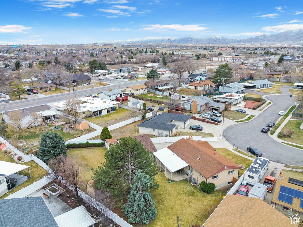 Drone / aerial view with a mountain view and a residential view