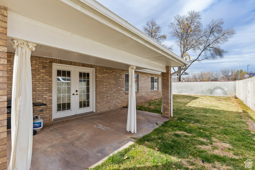 View of patio / terrace featuring french doors and a fenced backyard