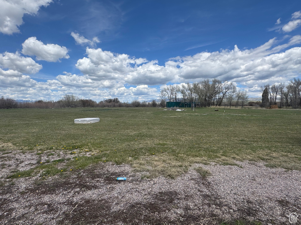 View of grassy yard featuring a view of rural / pastoral area