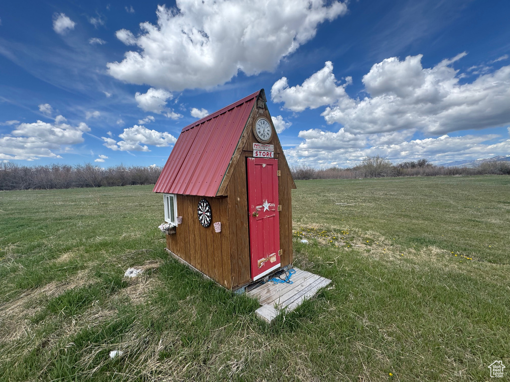 View of shed featuring a view of rural / pastoral area