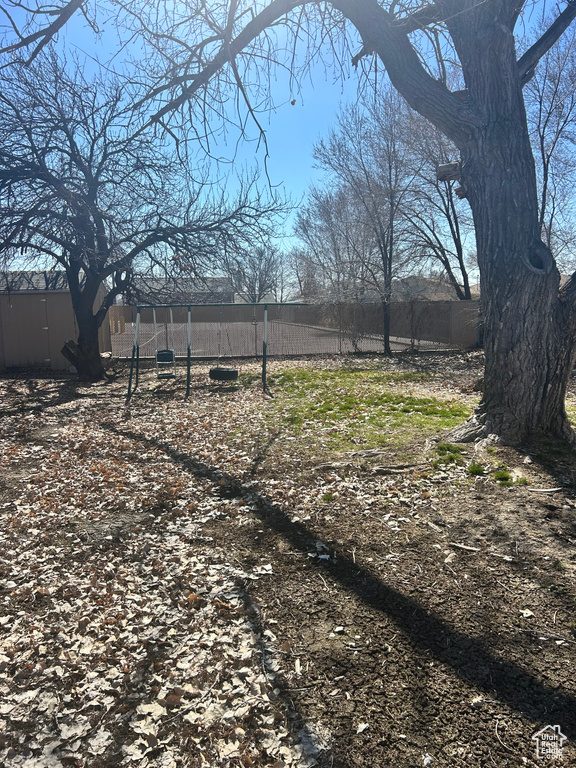 View of yard with fence
