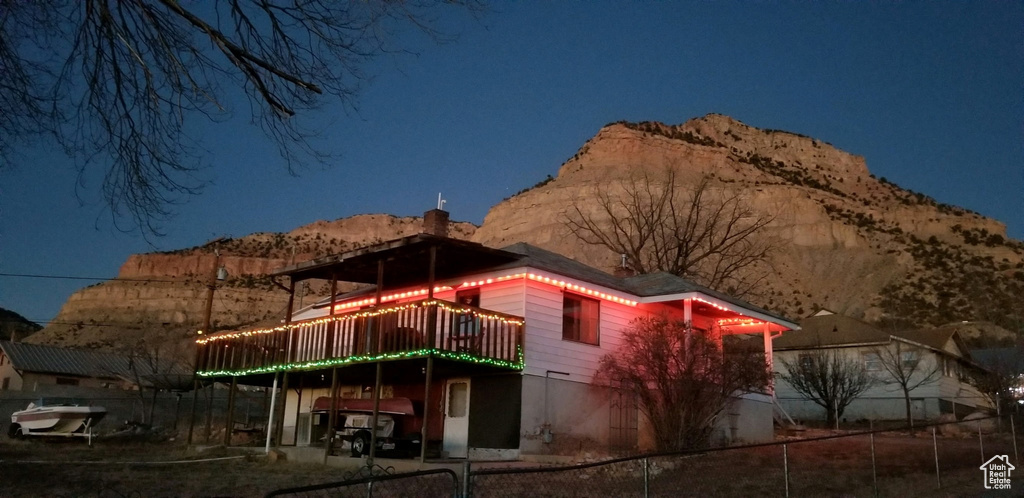 View of front facade featuring a deck with mountain view
