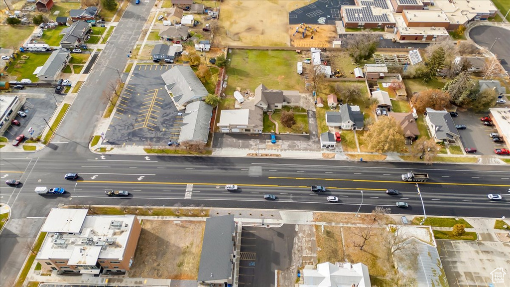 Birds eye view of property with a residential view