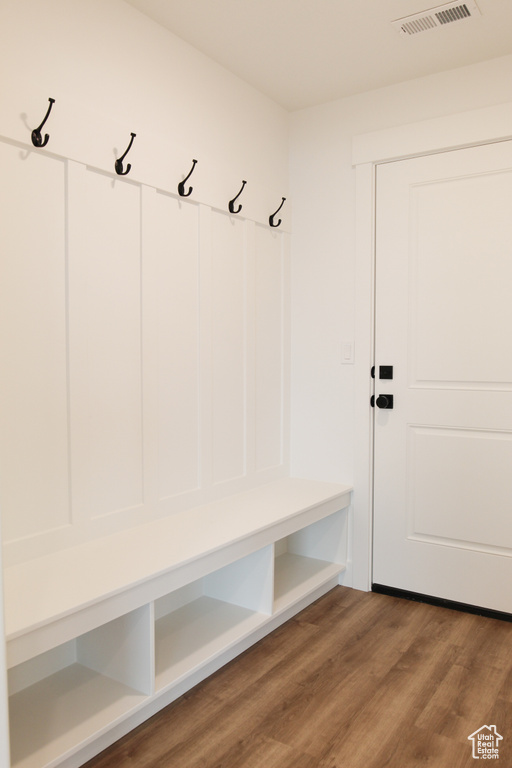 Mudroom featuring wood finished floors
