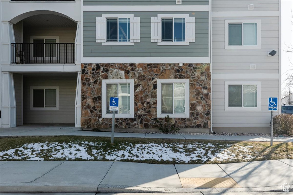 View of front of property with stone siding