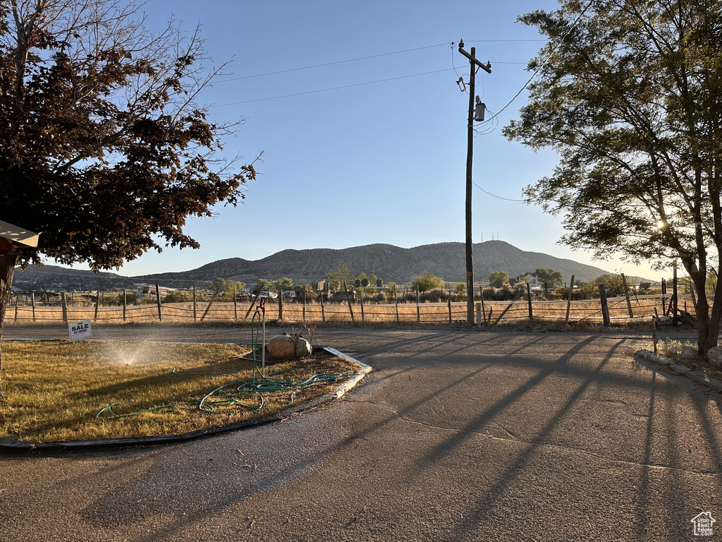 View of street featuring a rural view and a mountain view