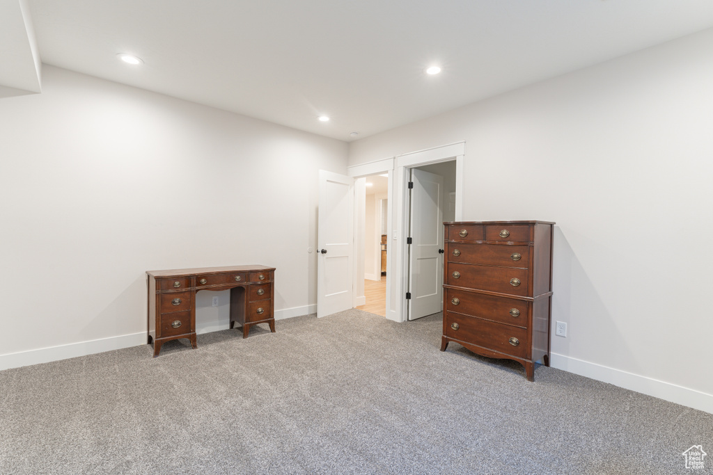 Unfurnished bedroom with baseboards, carpet flooring, and recessed lighting