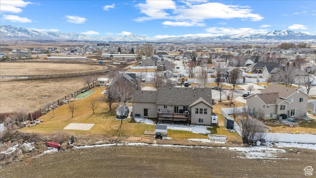 Birds eye view of property with a residential view and a mountain view