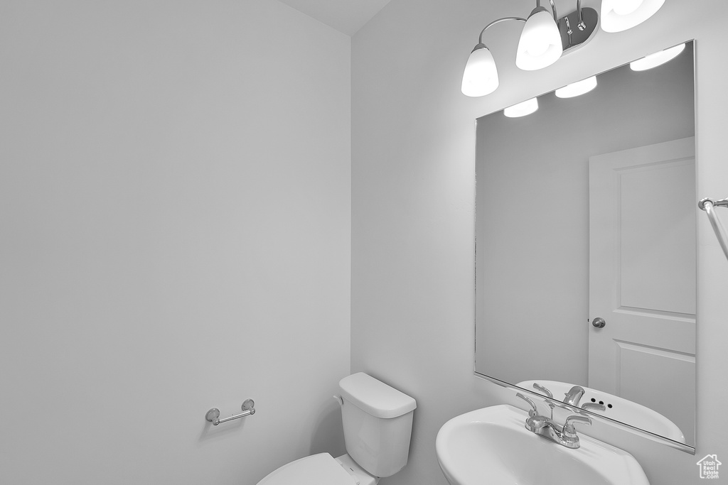 Bathroom featuring toilet and a sink