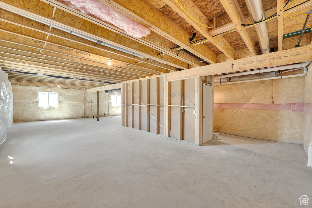 Basement featuring a wealth of natural light