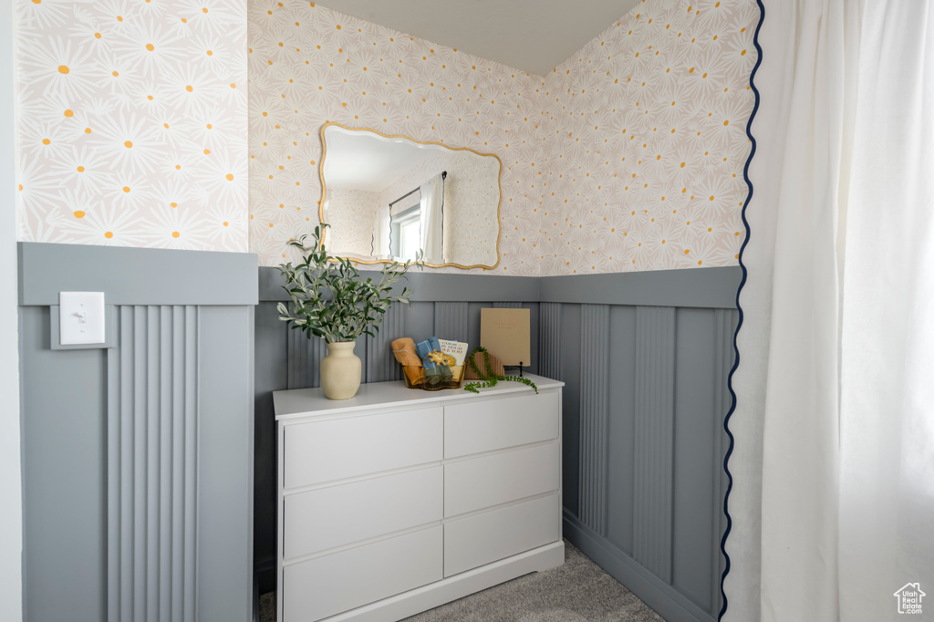 Interior details featuring carpet floors and wallpapered walls