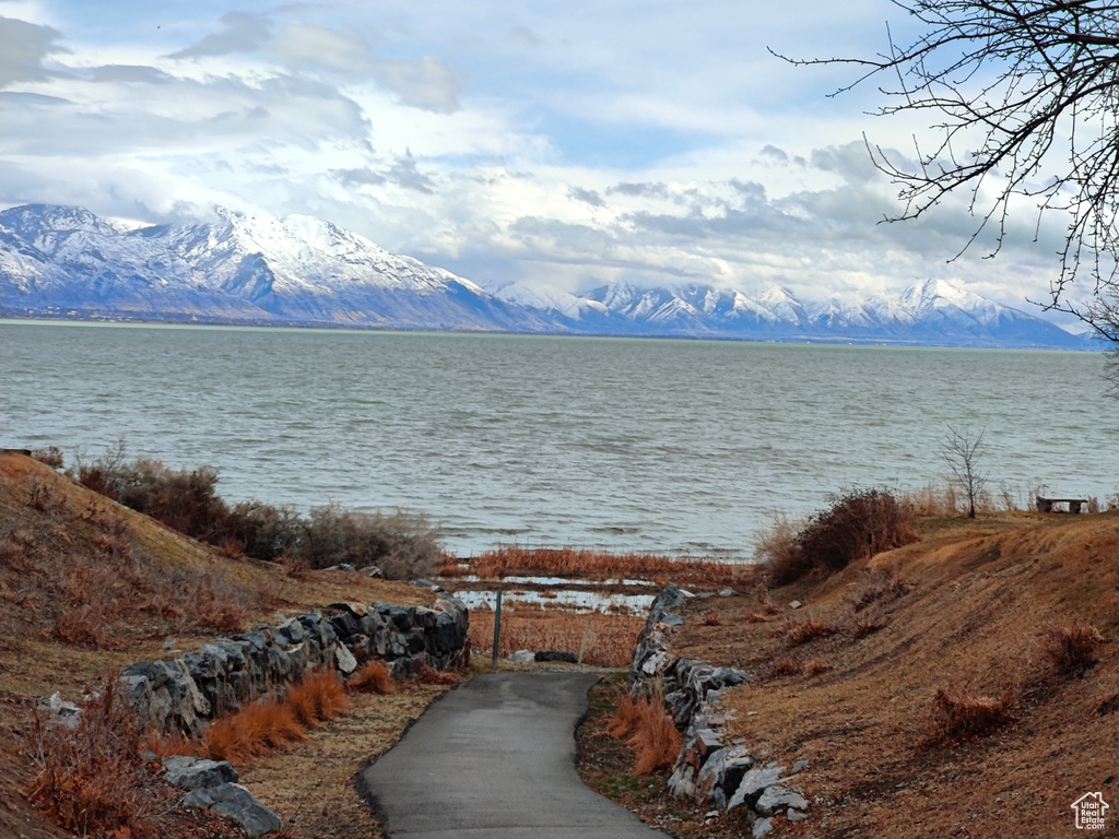 View of water feature with a mountain view