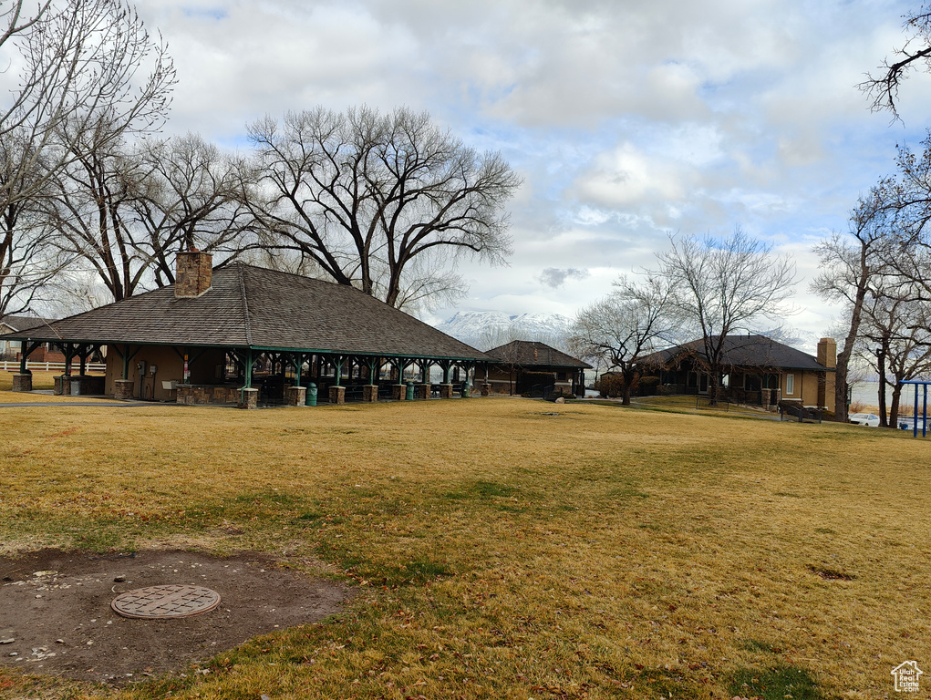 Exterior space featuring a yard