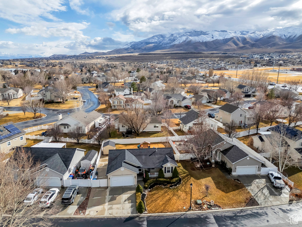 Drone / aerial view featuring a residential view and a mountain view