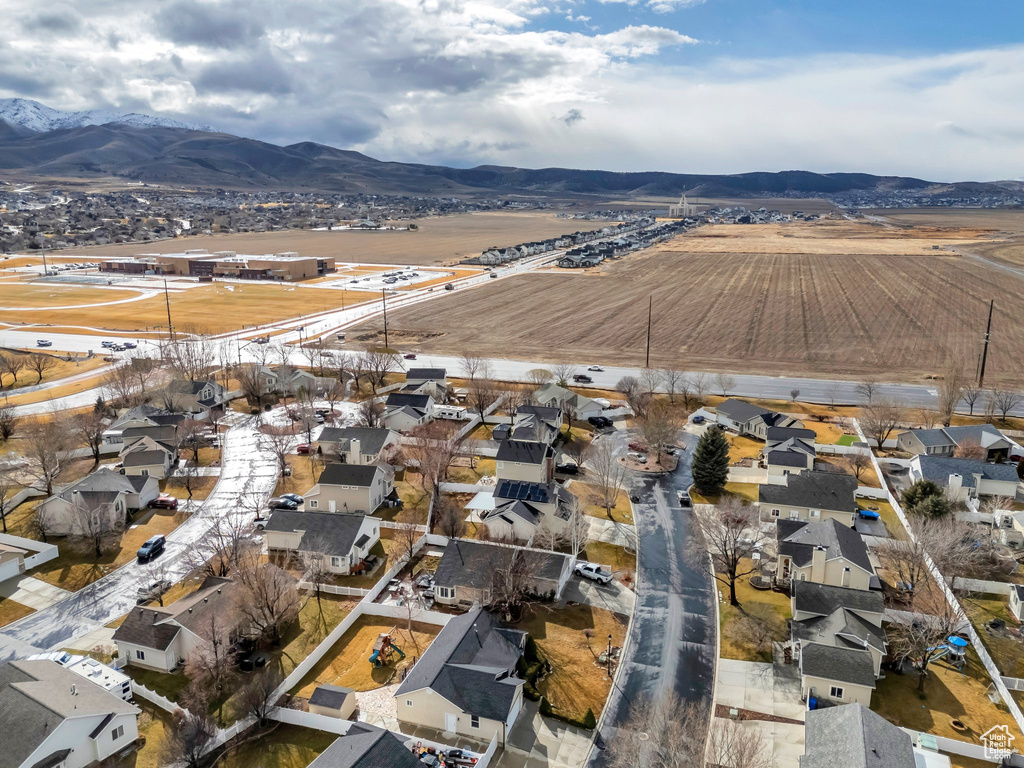 Birds eye view of property featuring a residential view and a mountain view