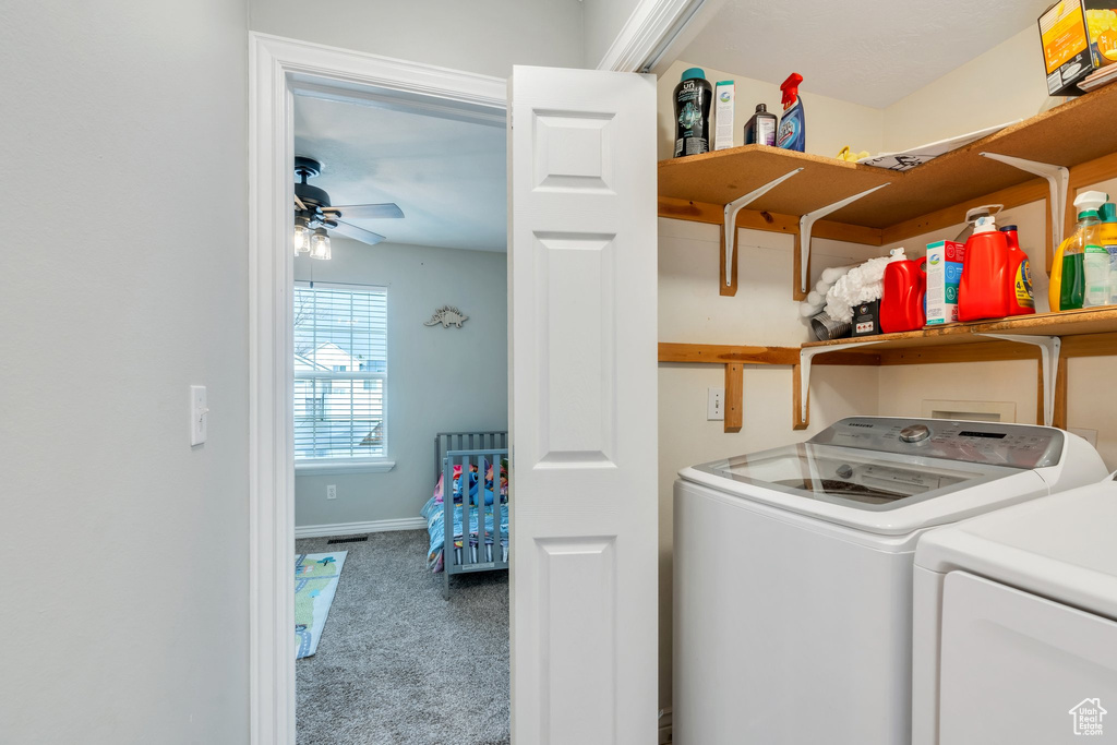 Washroom with laundry area, baseboards, ceiling fan, washing machine and clothes dryer, and carpet flooring