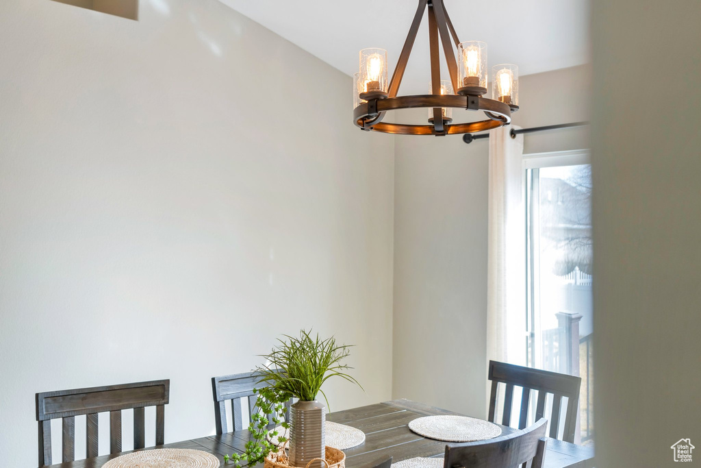 Dining area with a chandelier