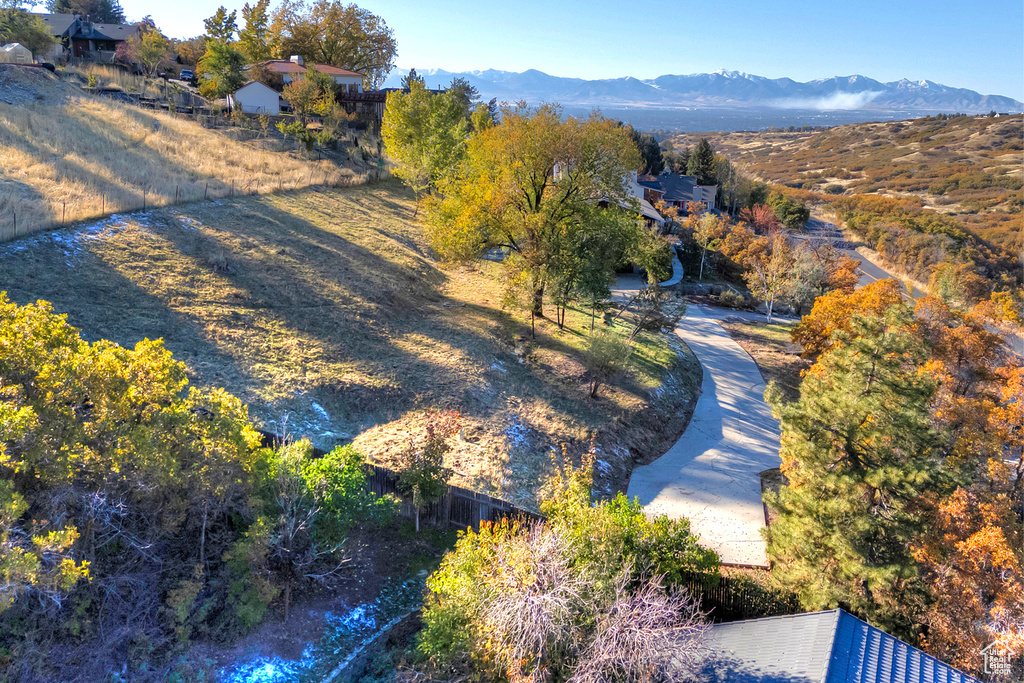 Birds eye view of property featuring a mountain view