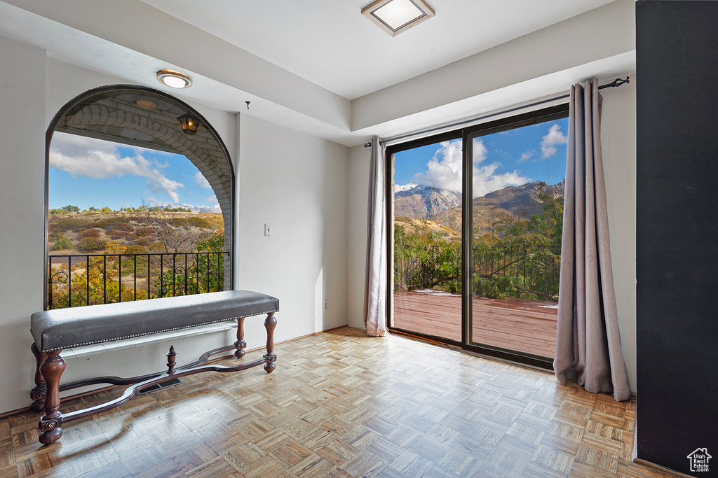 Interior space with visible vents and a mountain view