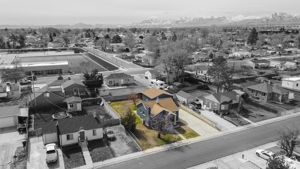 Drone / aerial view with a residential view and a mountain view