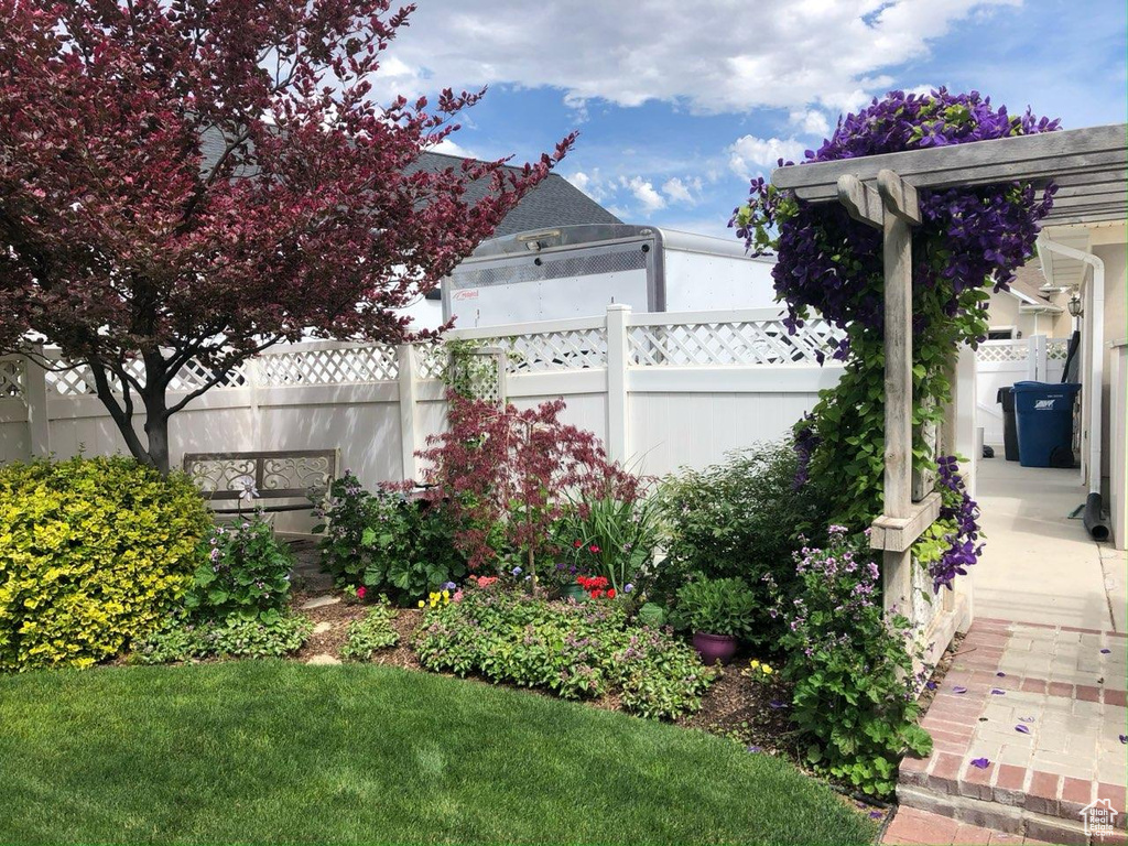 View of yard with fence