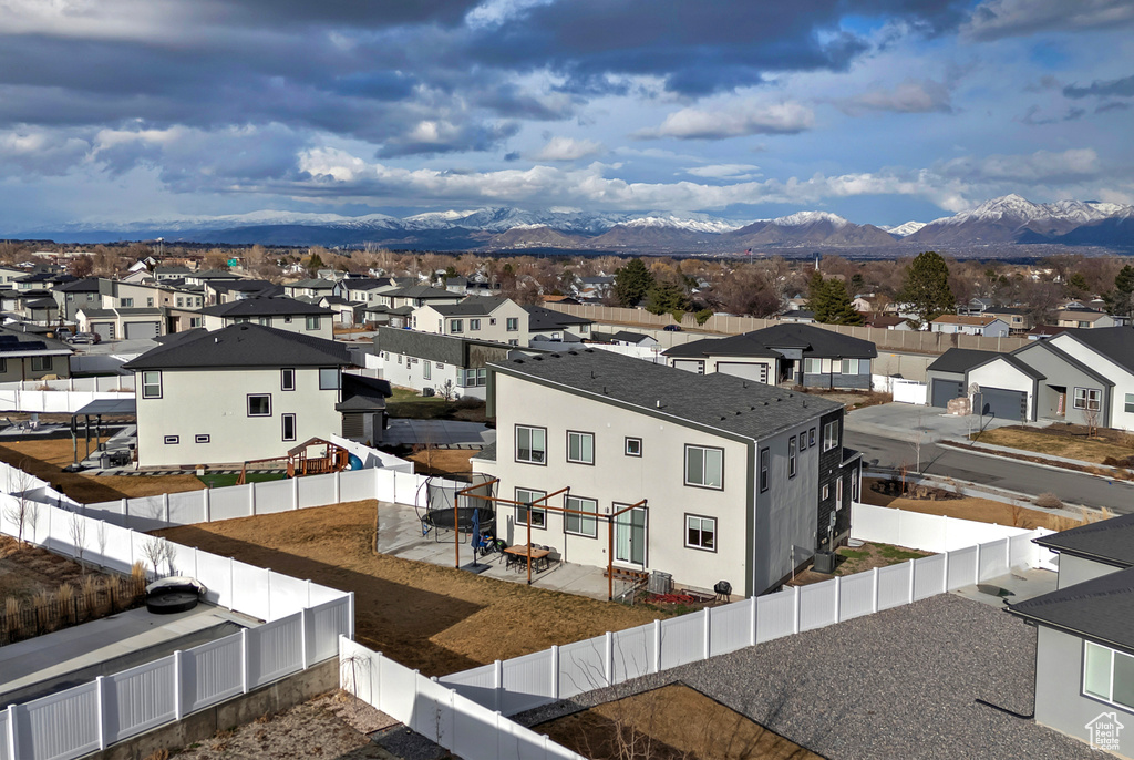 Aerial view featuring a residential view and a mountain view