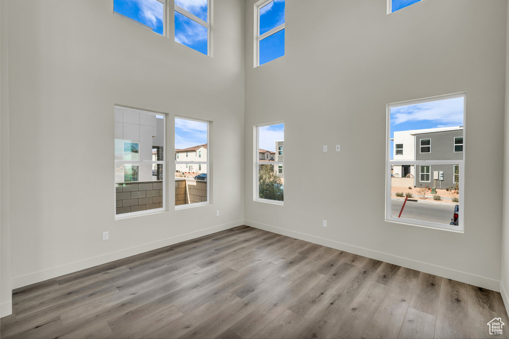 Interior space featuring baseboards and wood finished floors