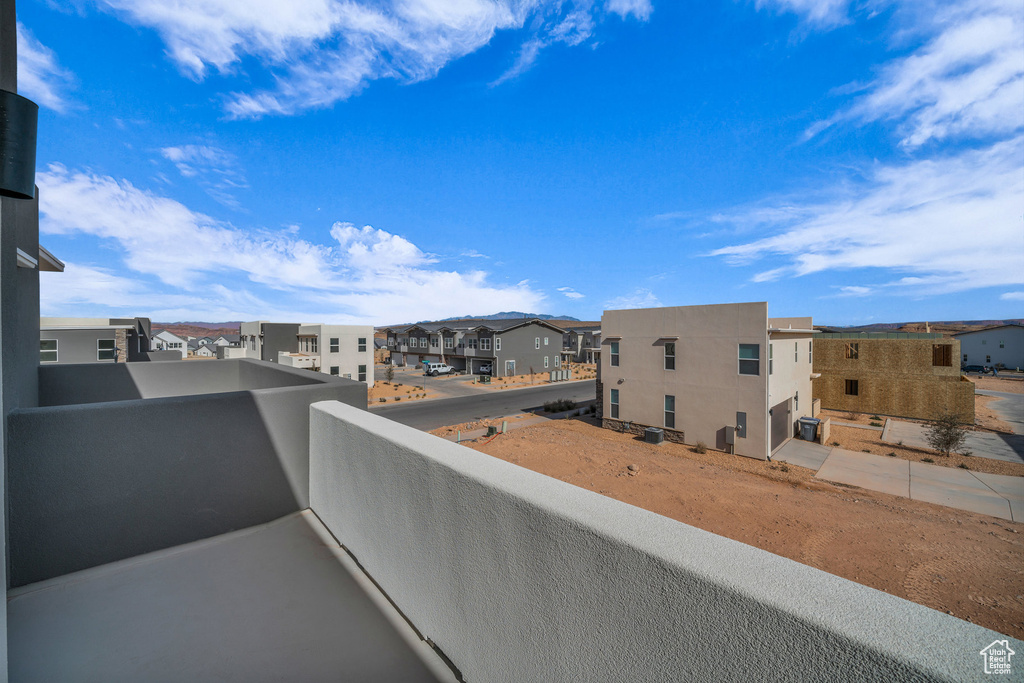 Balcony featuring a residential view