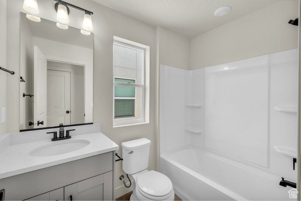 Bathroom with toilet and vanity
