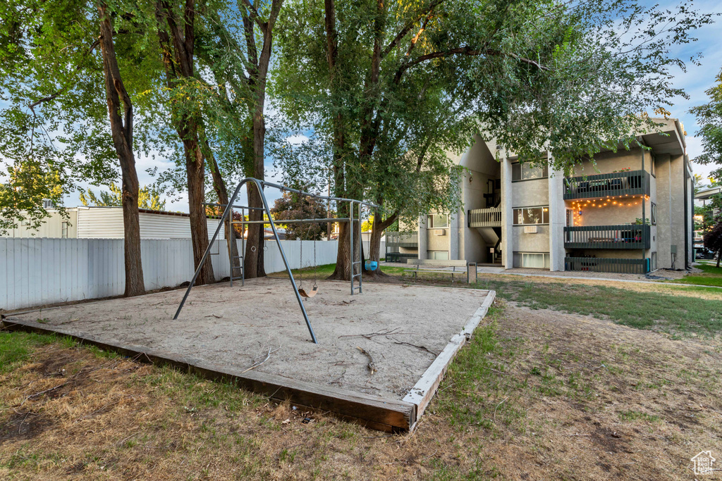 Exterior space with playground community and fence