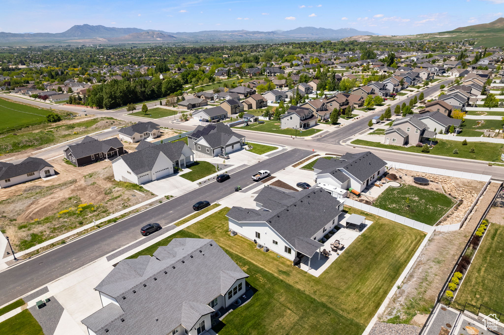 Aerial view of residential area featuring mountains