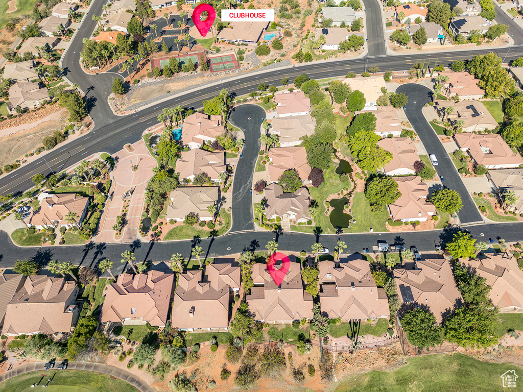 Birds eye view of property with a residential view