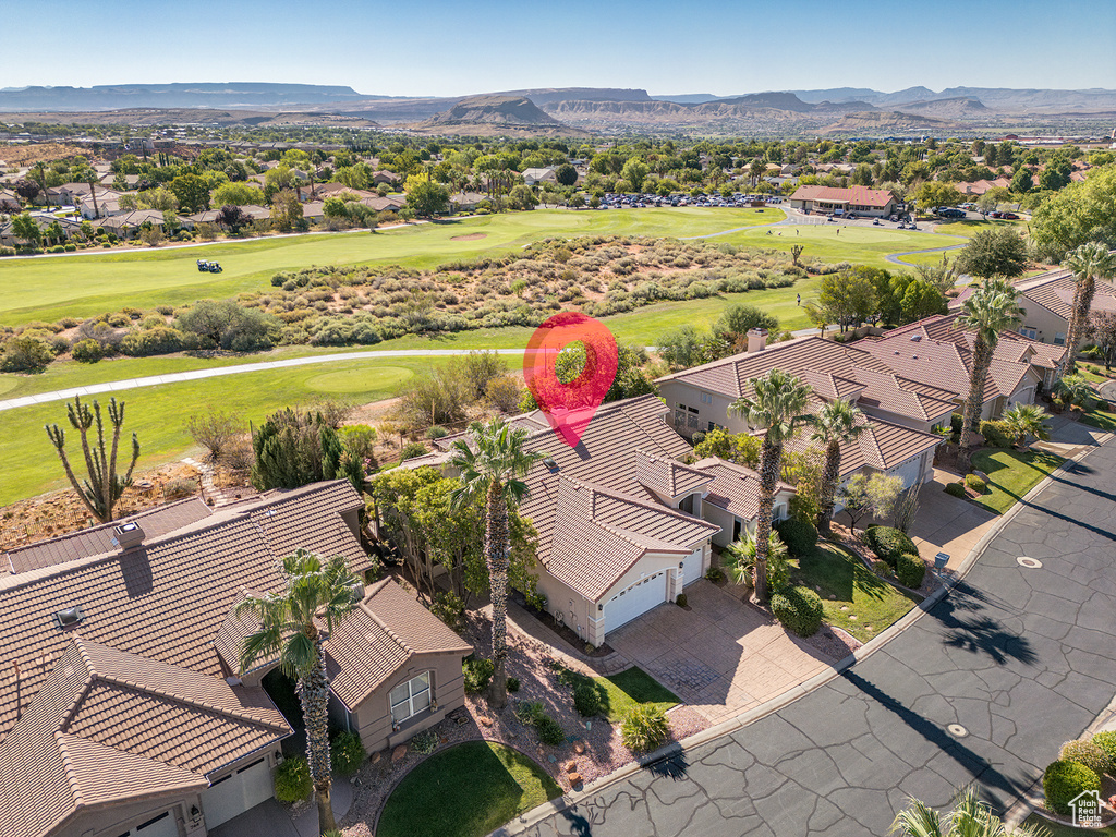 Aerial view featuring a residential view, a mountain view, and golf course view