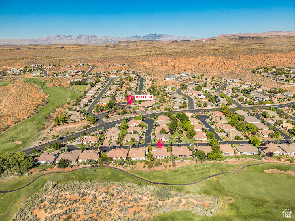 Drone / aerial view featuring golf course view, a residential view, and a mountain view