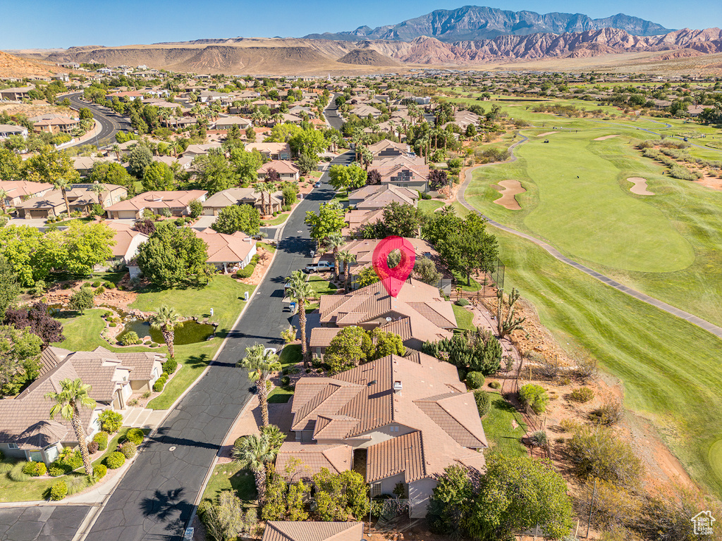 Birds eye view of property with a residential view, a mountain view, and golf course view