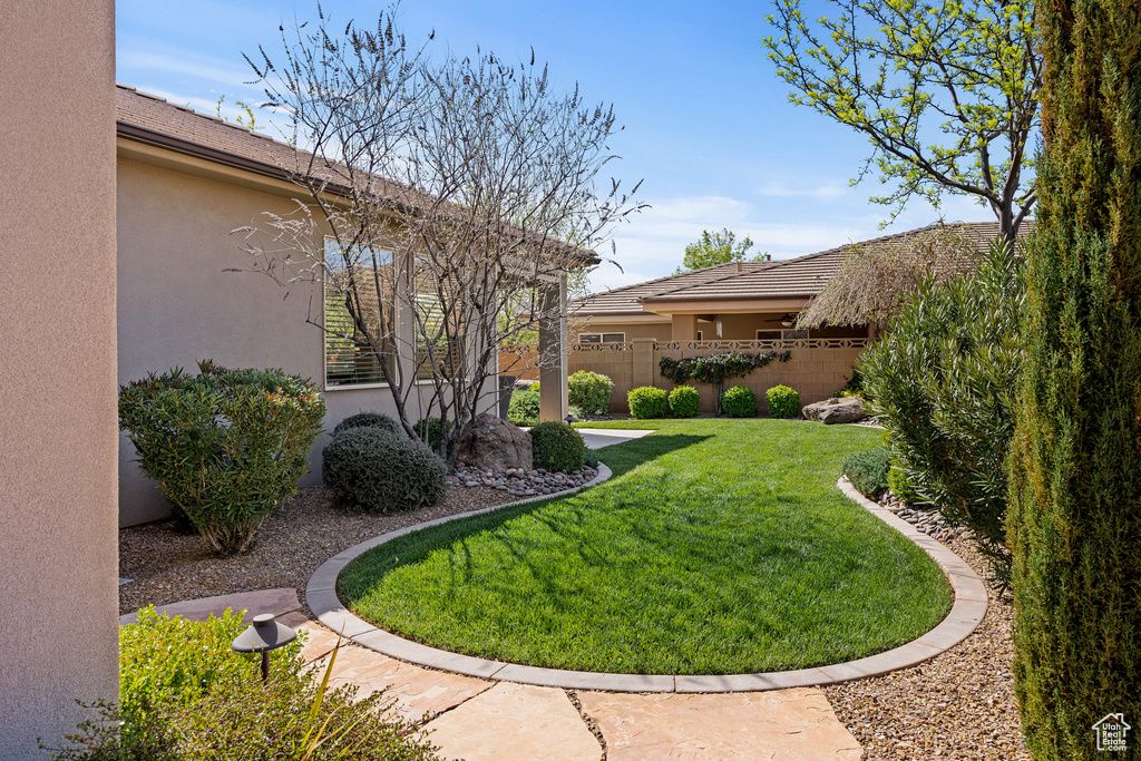 View of yard with fence