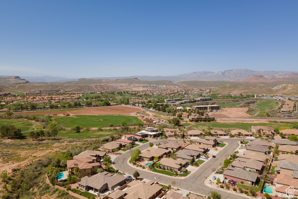 Drone / aerial view with view of golf course, a residential view, and a mountain view