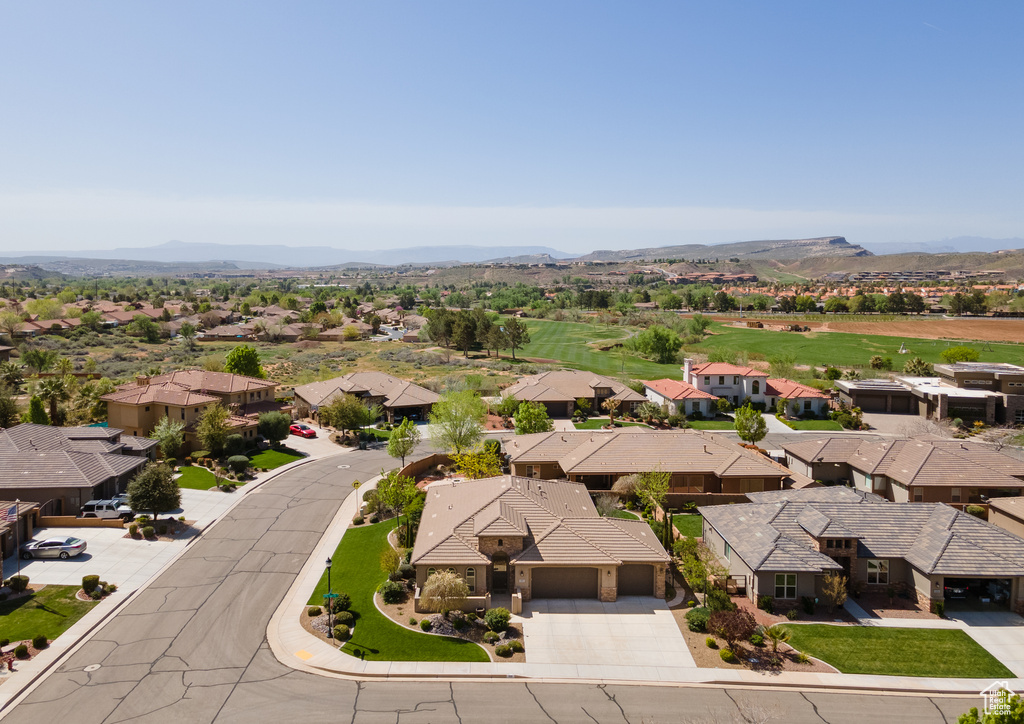 Birds eye view of property with a residential view and a mountain view