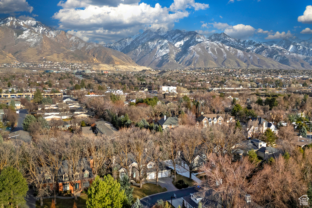 Property view of mountains featuring a residential view