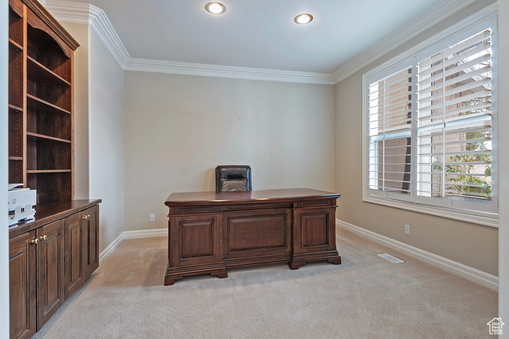 Office area with light carpet, visible vents, baseboards, crown molding, and recessed lighting