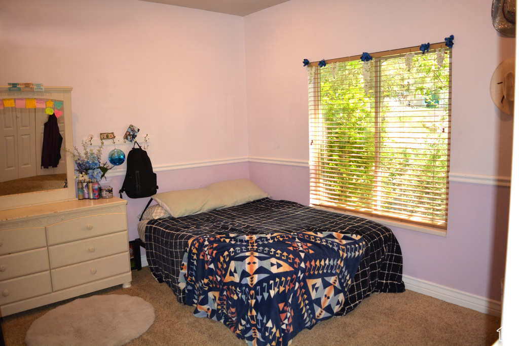 View of carpeted bedroom