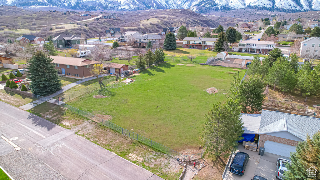 Birds eye view of property featuring a residential view and a mountain view