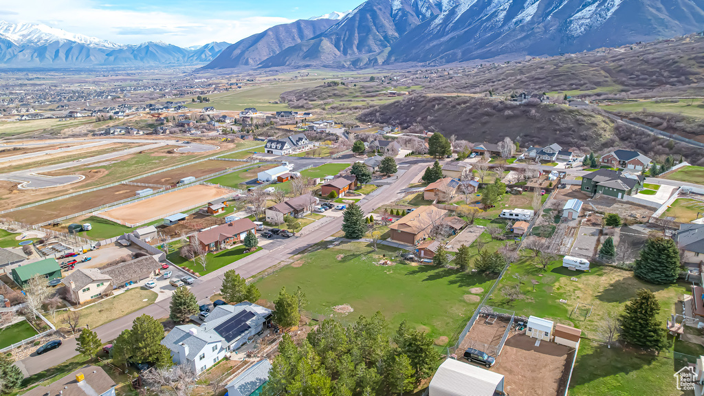 Birds eye view of property with a residential view and a mountain view