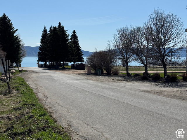 View of road with a water and mountain view