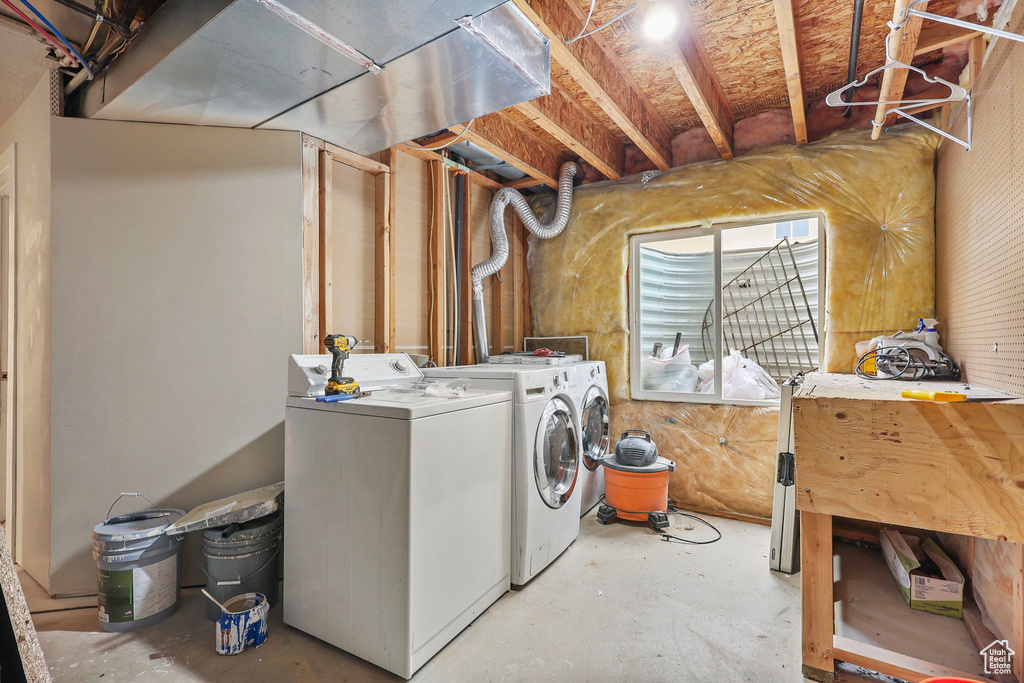 Washroom with laundry area and independent washer and dryer