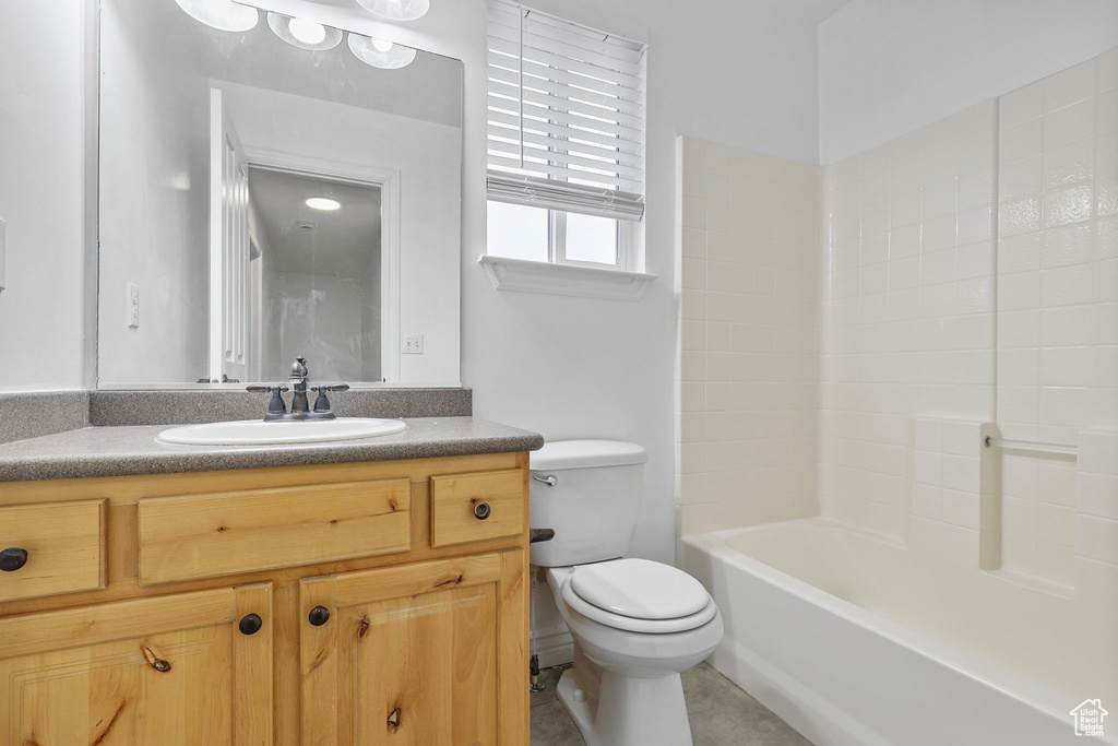 Full bathroom featuring vanity and toilet