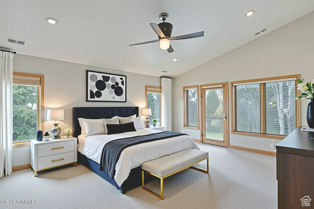 Bedroom with access to outside, light carpet, recessed lighting, vaulted ceiling, and ceiling fan