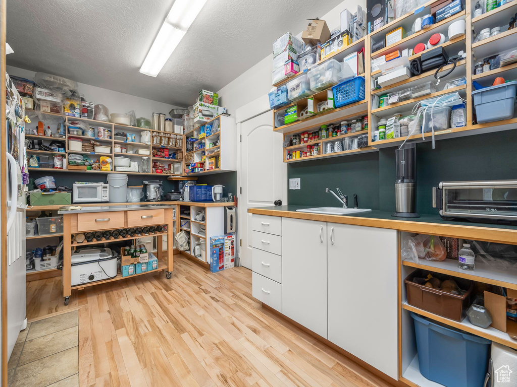Storage featuring a sink