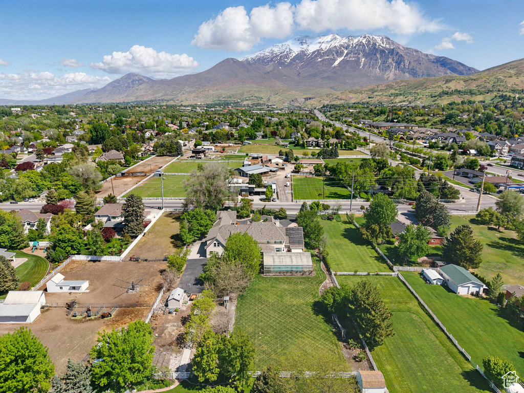 Aerial view of residential area with a mountain backdrop