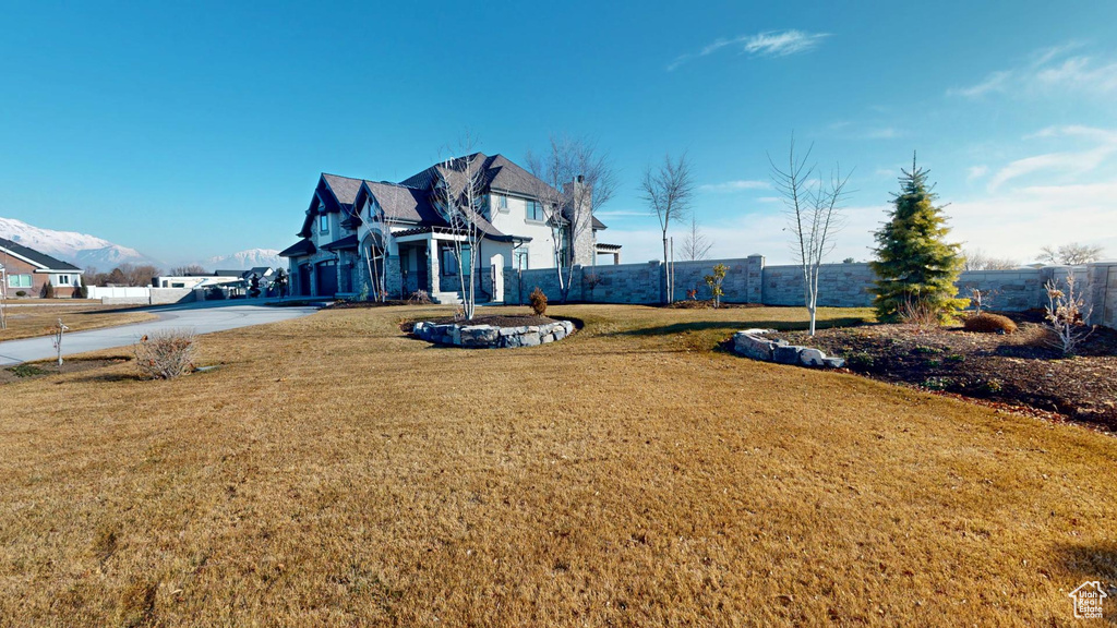 View of yard with fence